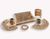 Graphite lubricated bronze bushings and bearings with grooves and plugs for self-lubrication.