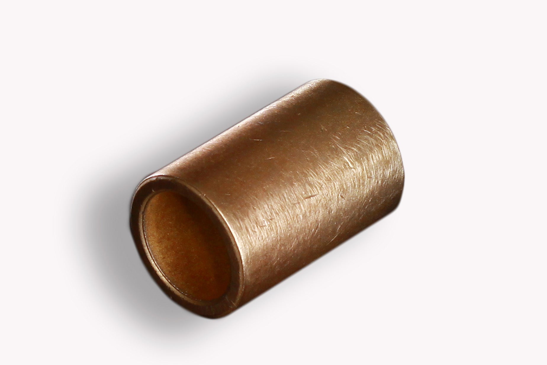 Sintered bronze sleeve bushings that are oil impregnated.